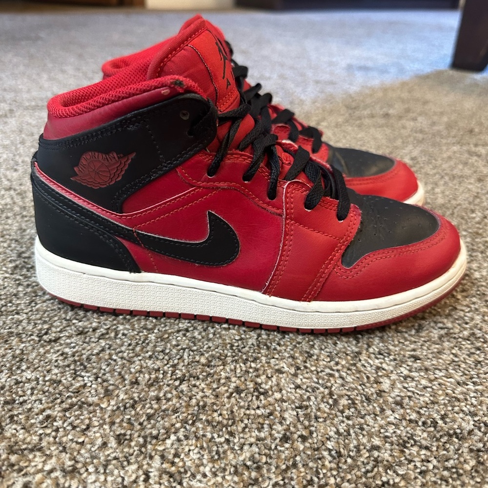Kids Red and Black Nike Sneakers